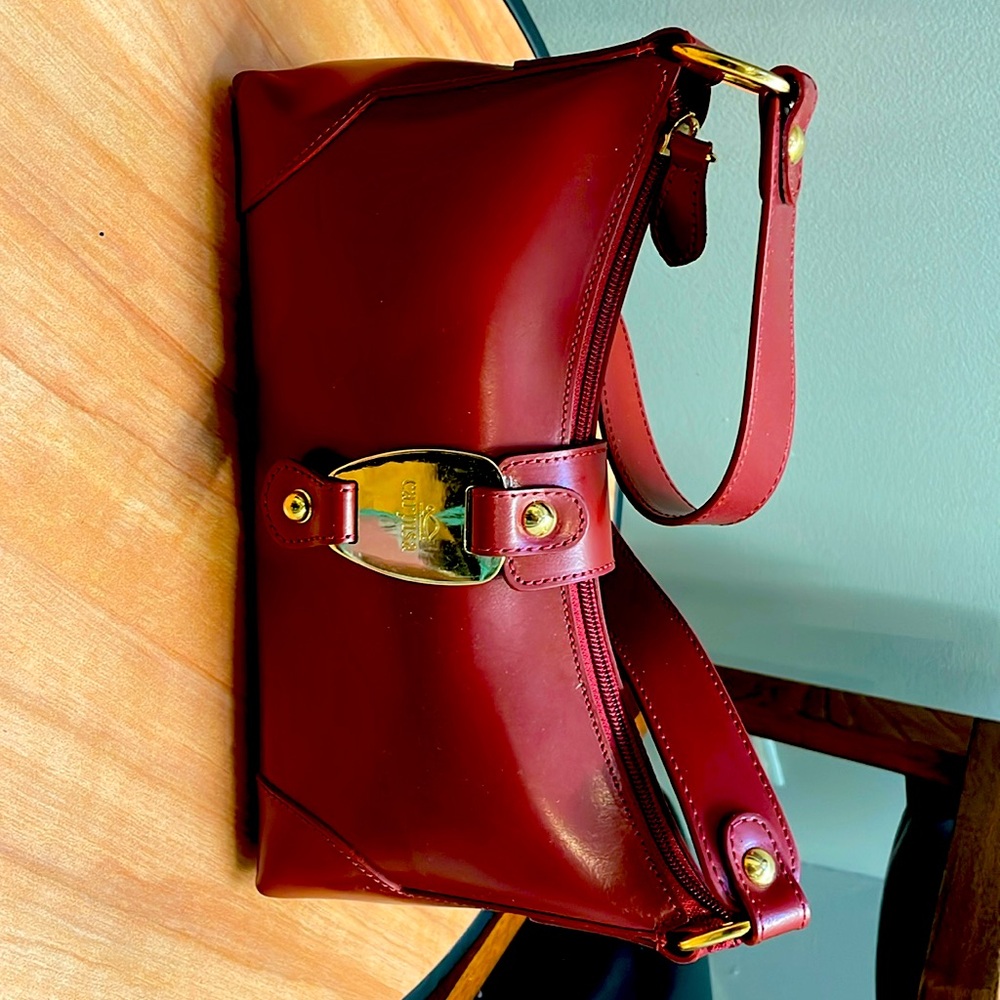 Carpisa red/burgundy purse